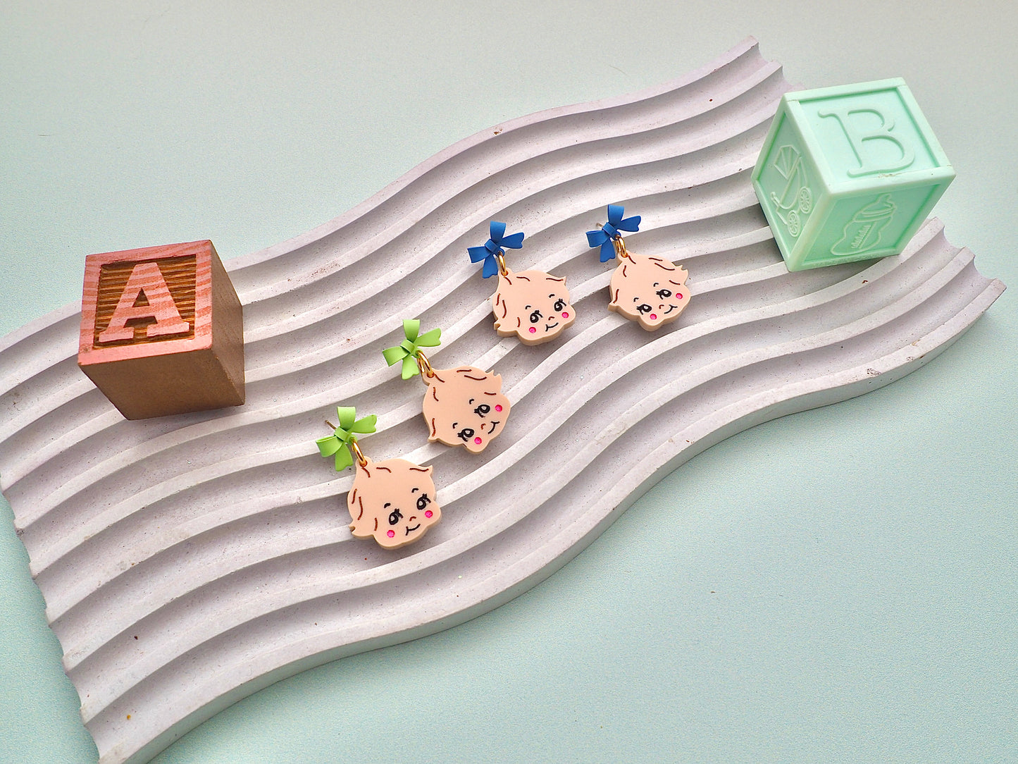 Kewpie Baby kitsch earrings