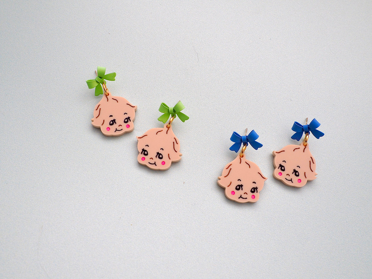 Kewpie Baby kitsch earrings