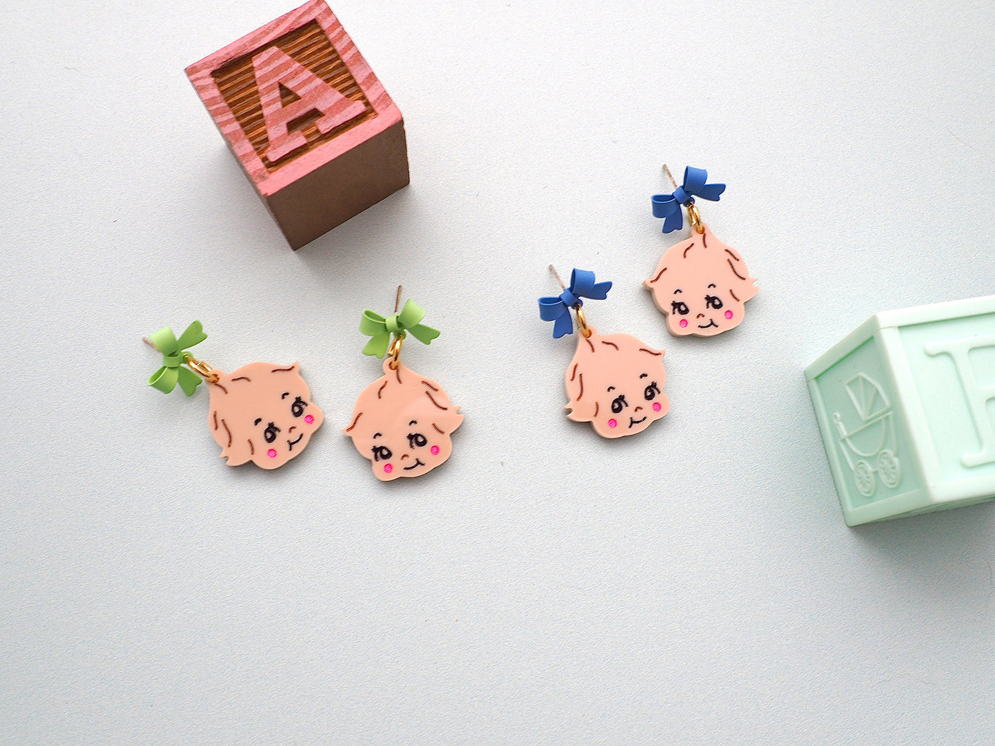 Kewpie Baby kitsch earrings