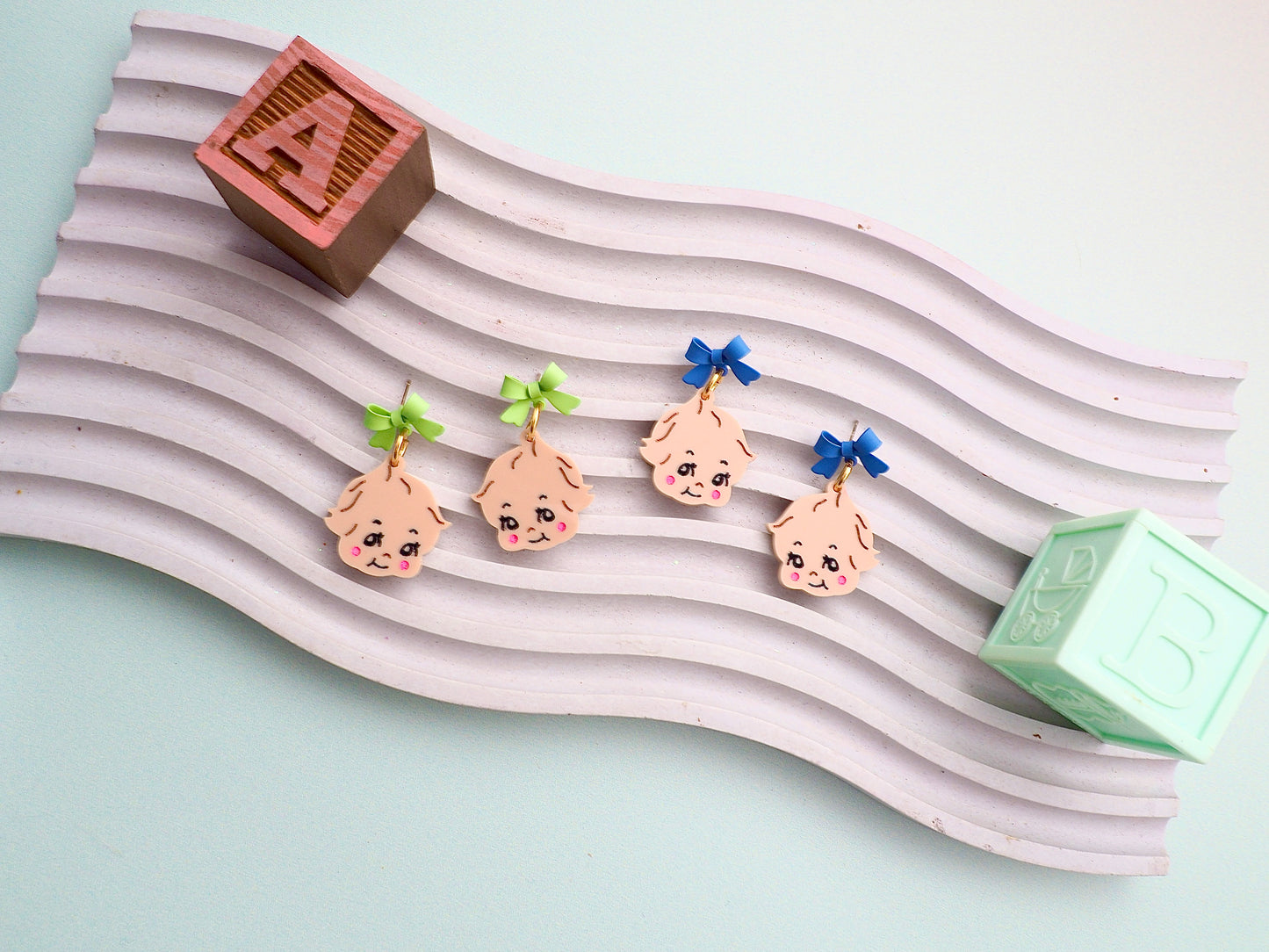 Kewpie Baby kitsch earrings