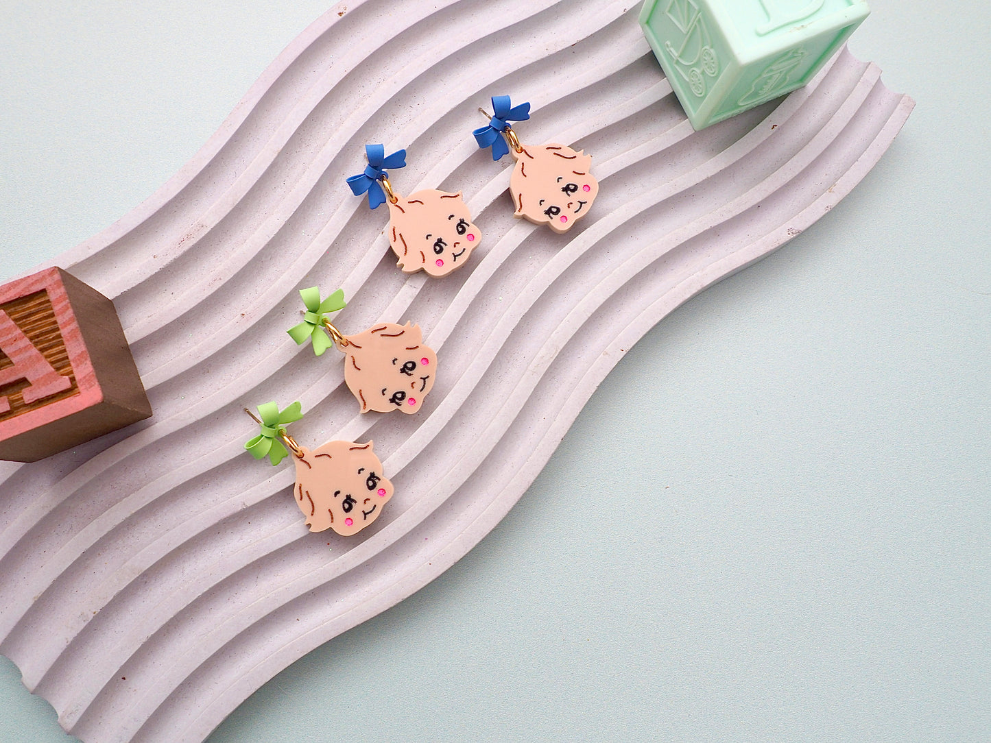Kewpie Baby kitsch earrings