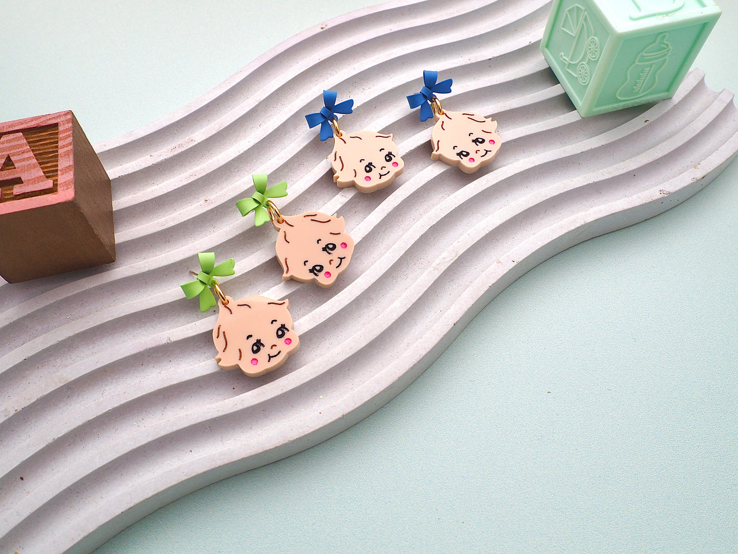 Kewpie Baby kitsch earrings